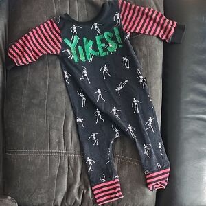 Playful Skeleton Kids Footie - Black with Red and Green Accents